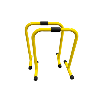 Yellow parallel bars (parallettes)